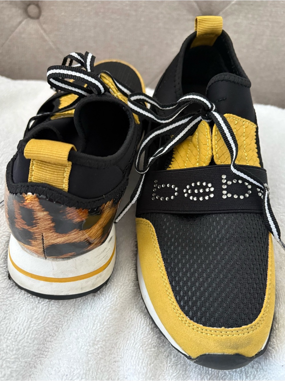 bebe Black and Yellow Women's Fashion Sneakers with Leopard Accent